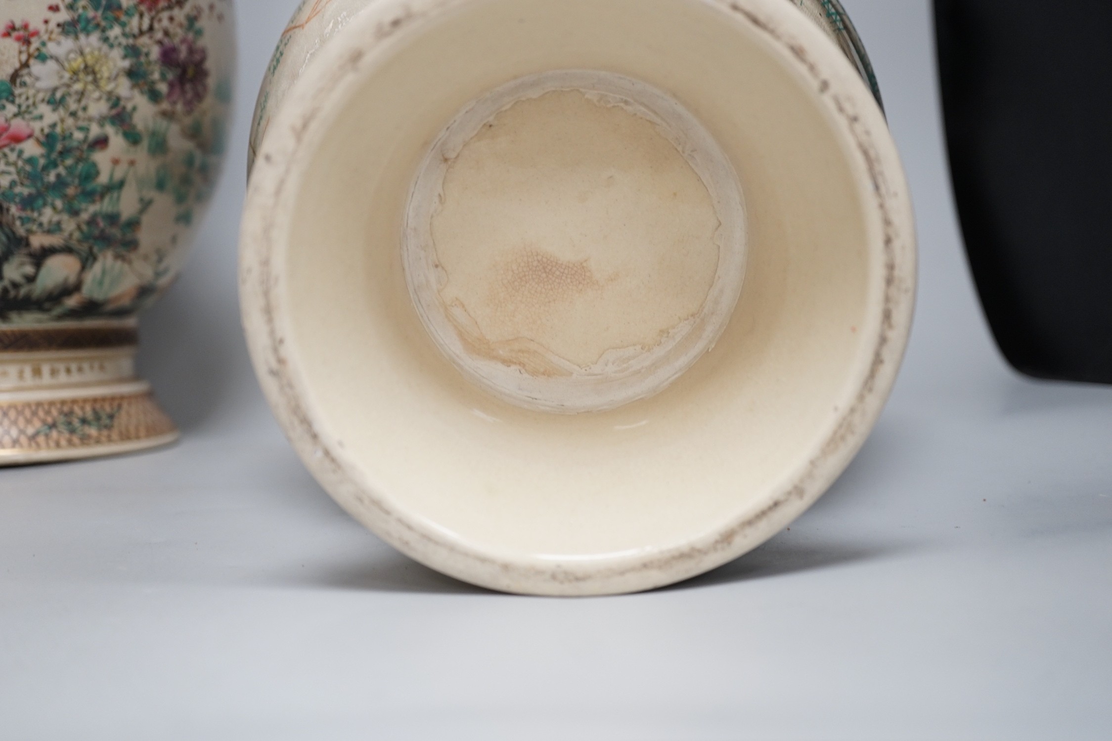 A pair of Japanese Satsuma pottery vases, Meiji period signed above foot, height 38cm